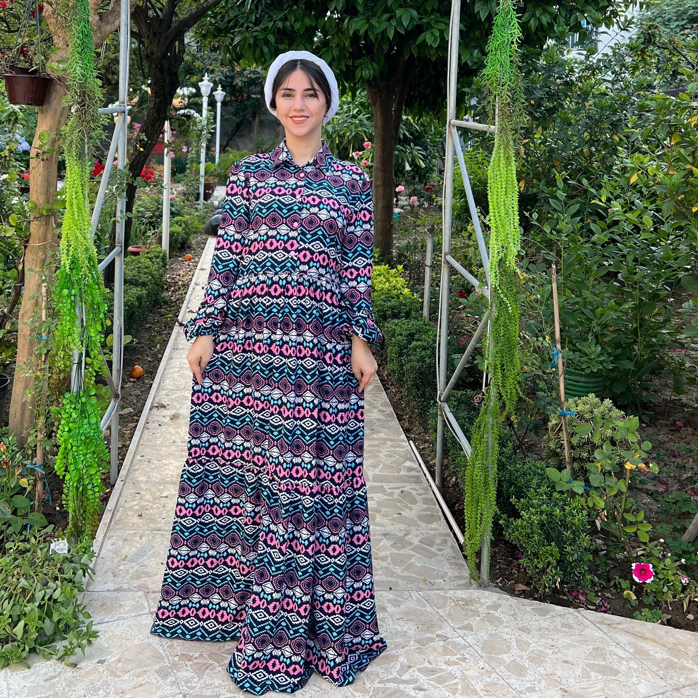 خرید پیراهن نخی سرمه ای سرخابی قد ۱۳۵ سانت بند کمر دارد جلو دکمه دارد 