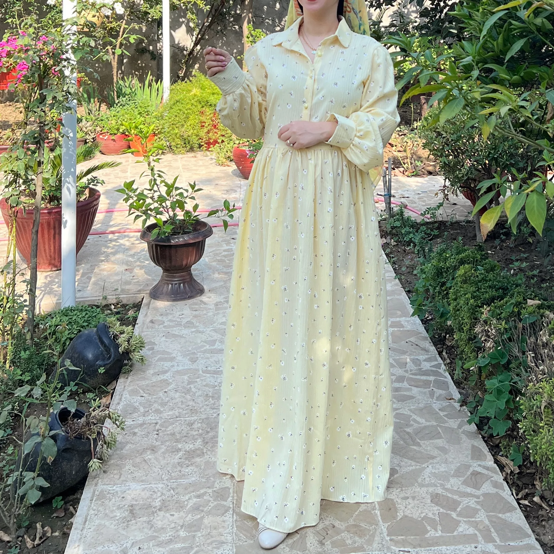 خرید پیراهن گل چرمی لیمویی قد ۱۳۸ بند کمر دارد 