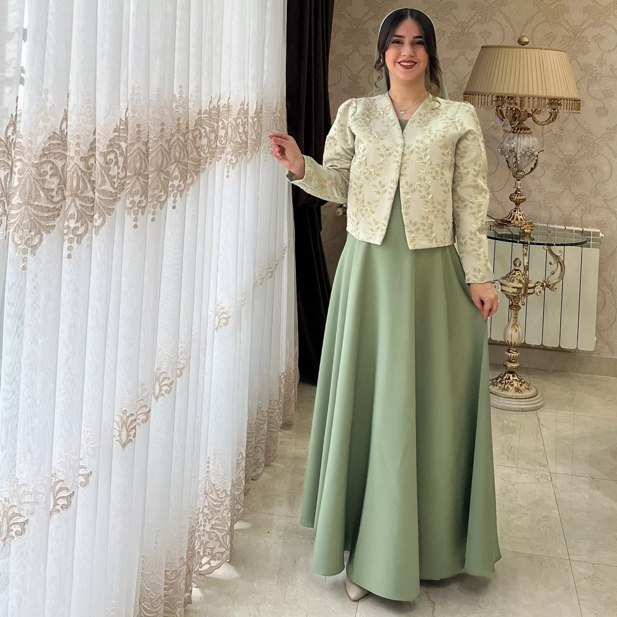 خرید کت و سرافان شکوفه سبز قد ۱۳۵ بند کمر دارد 