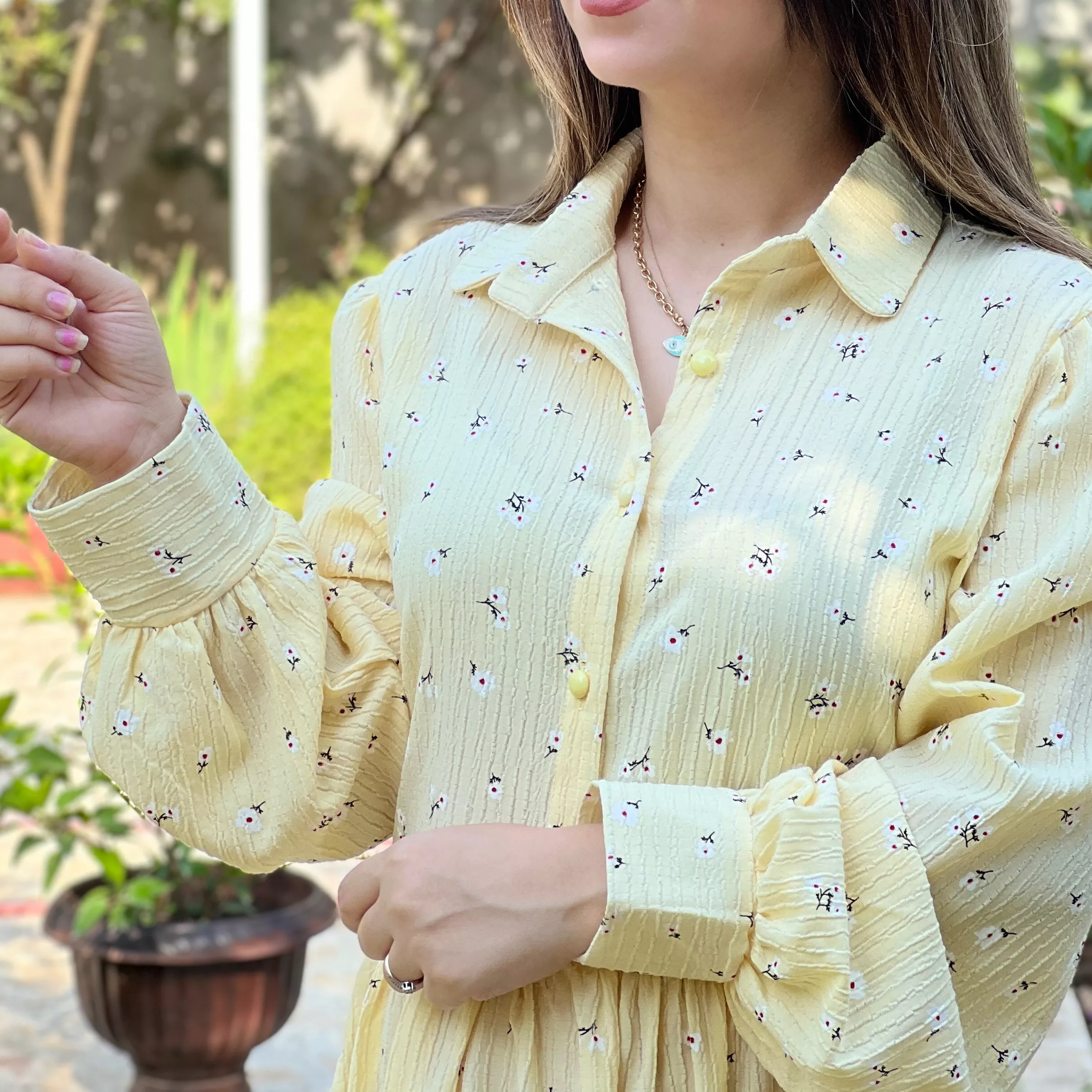 خرید پیراهن گل چرمی لیمویی قد ۱۳۸ بند کمر دارد 