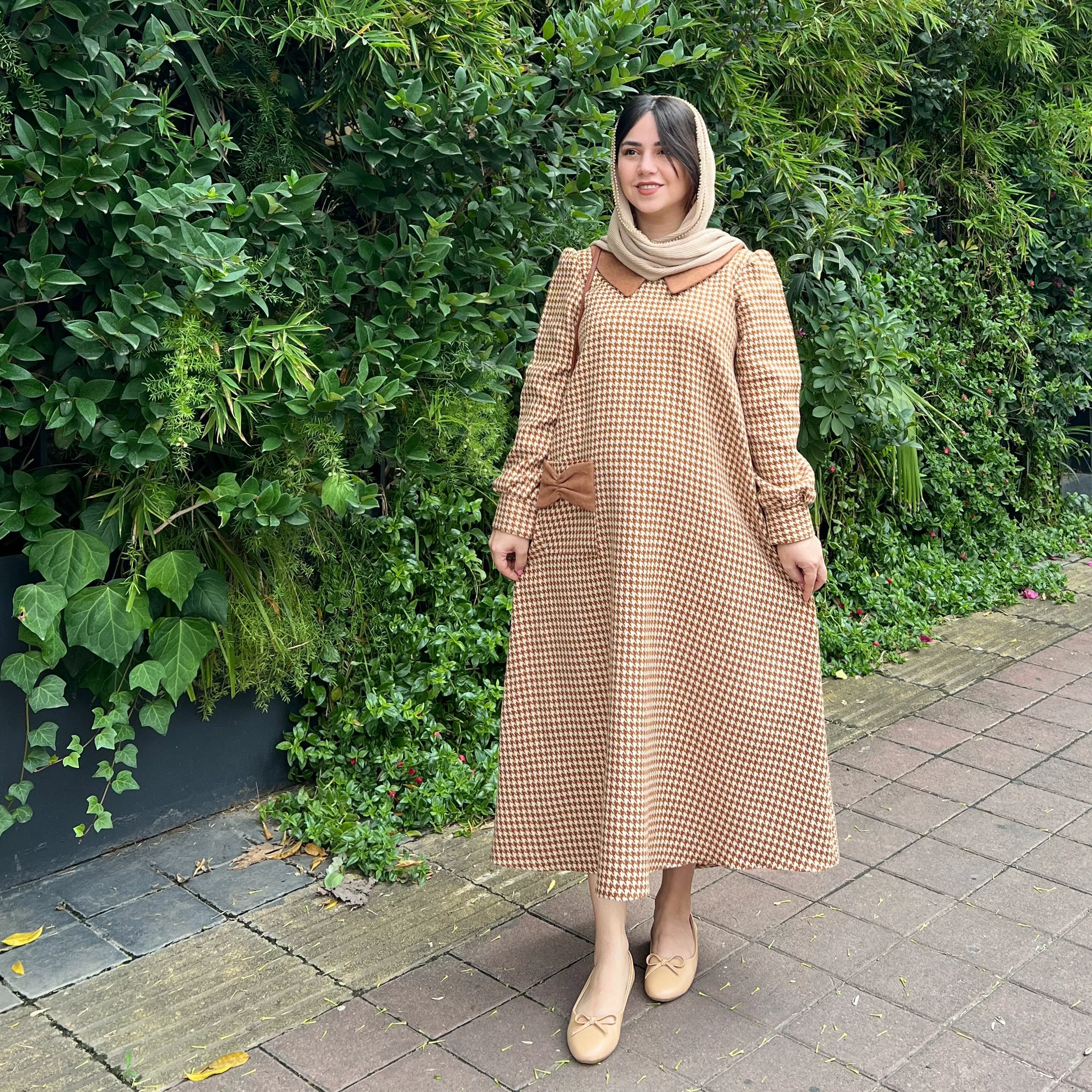 خرید پیراهن پاییزی نارنج قد ۱۲۸ بند کمر دارد 