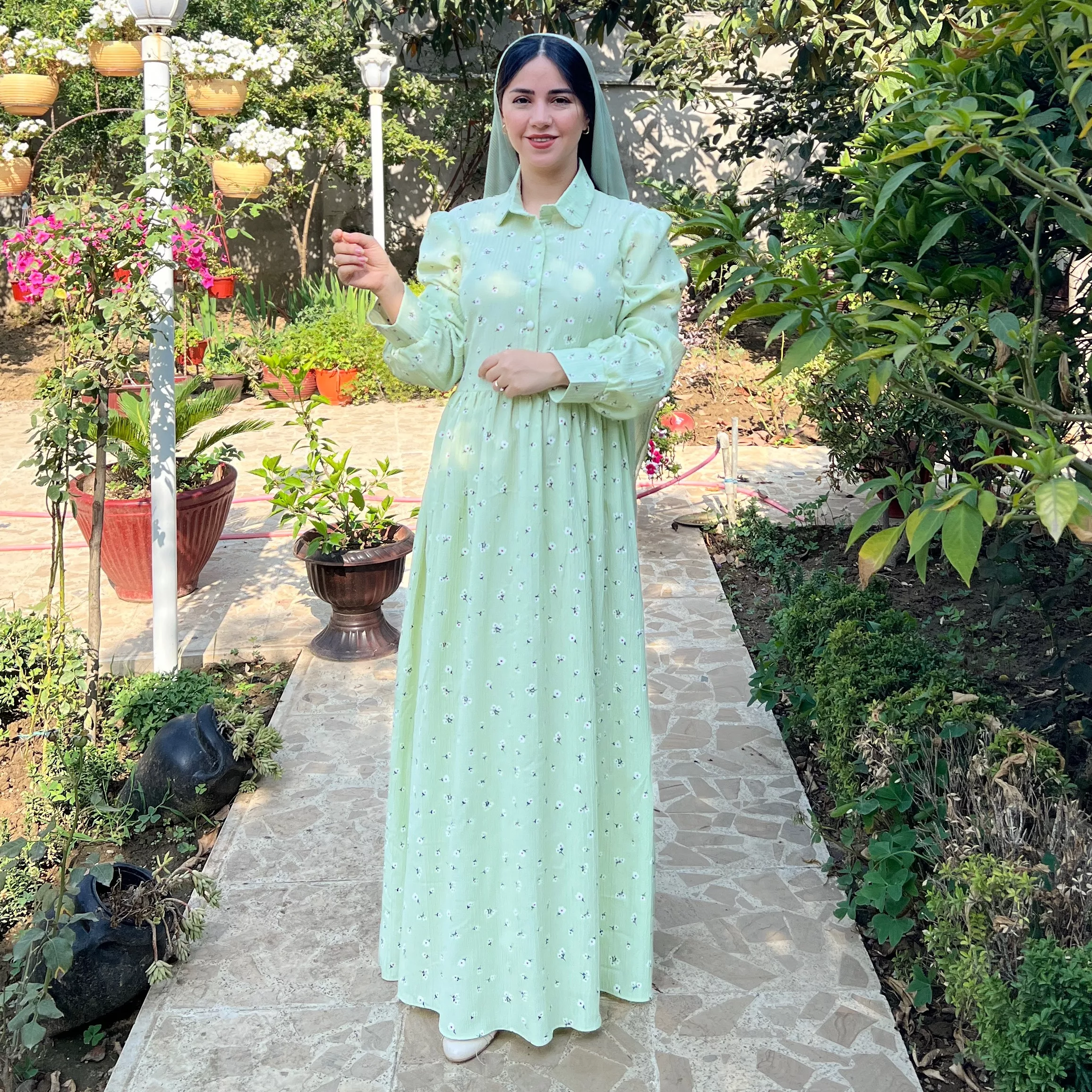 خرید پیراهن گل چرمی سبز  قد ۱۳۸ بند کمر دارد 