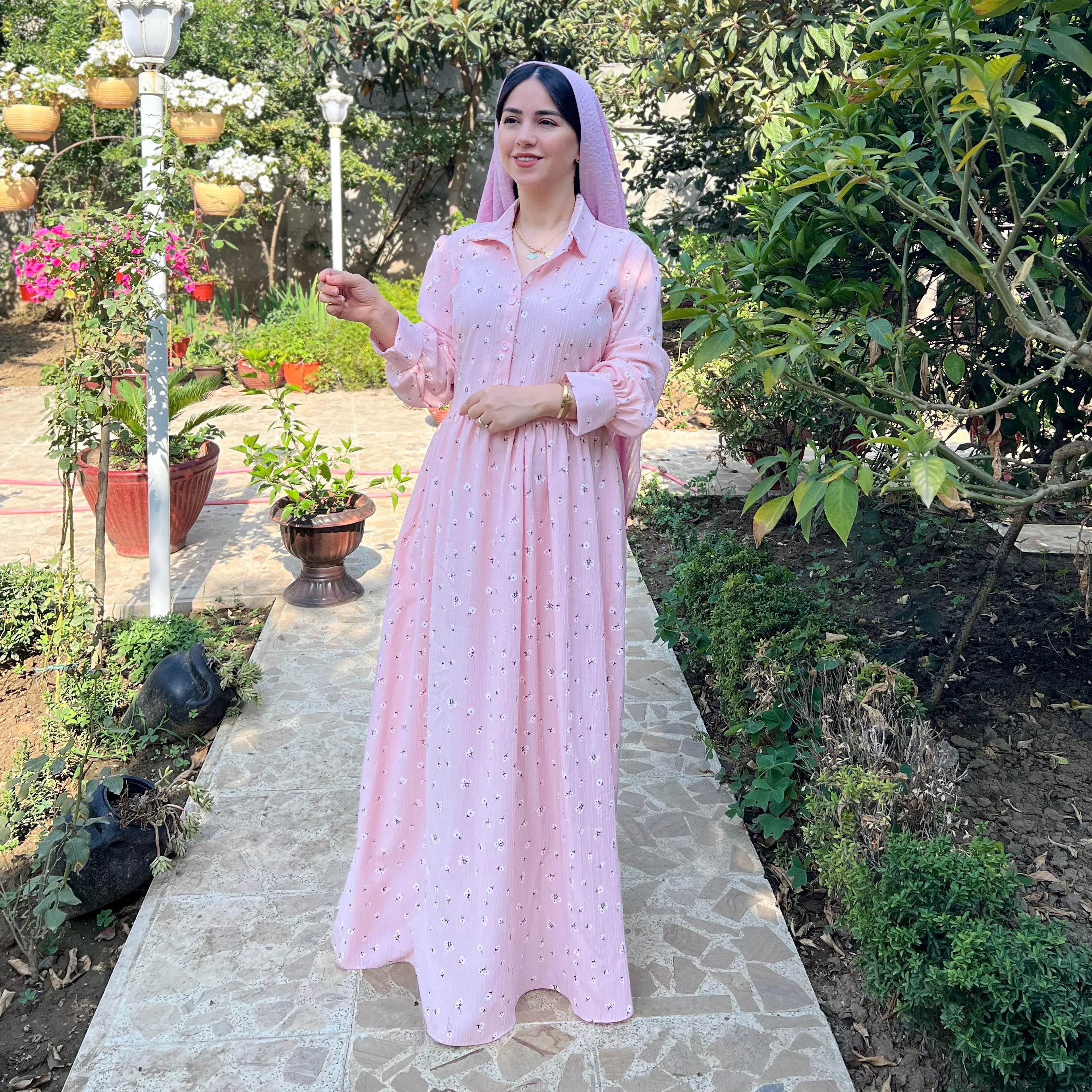 خرید پیراهن گل چرمی صورتی  قد ۱۳۸ بند کمر دارد 