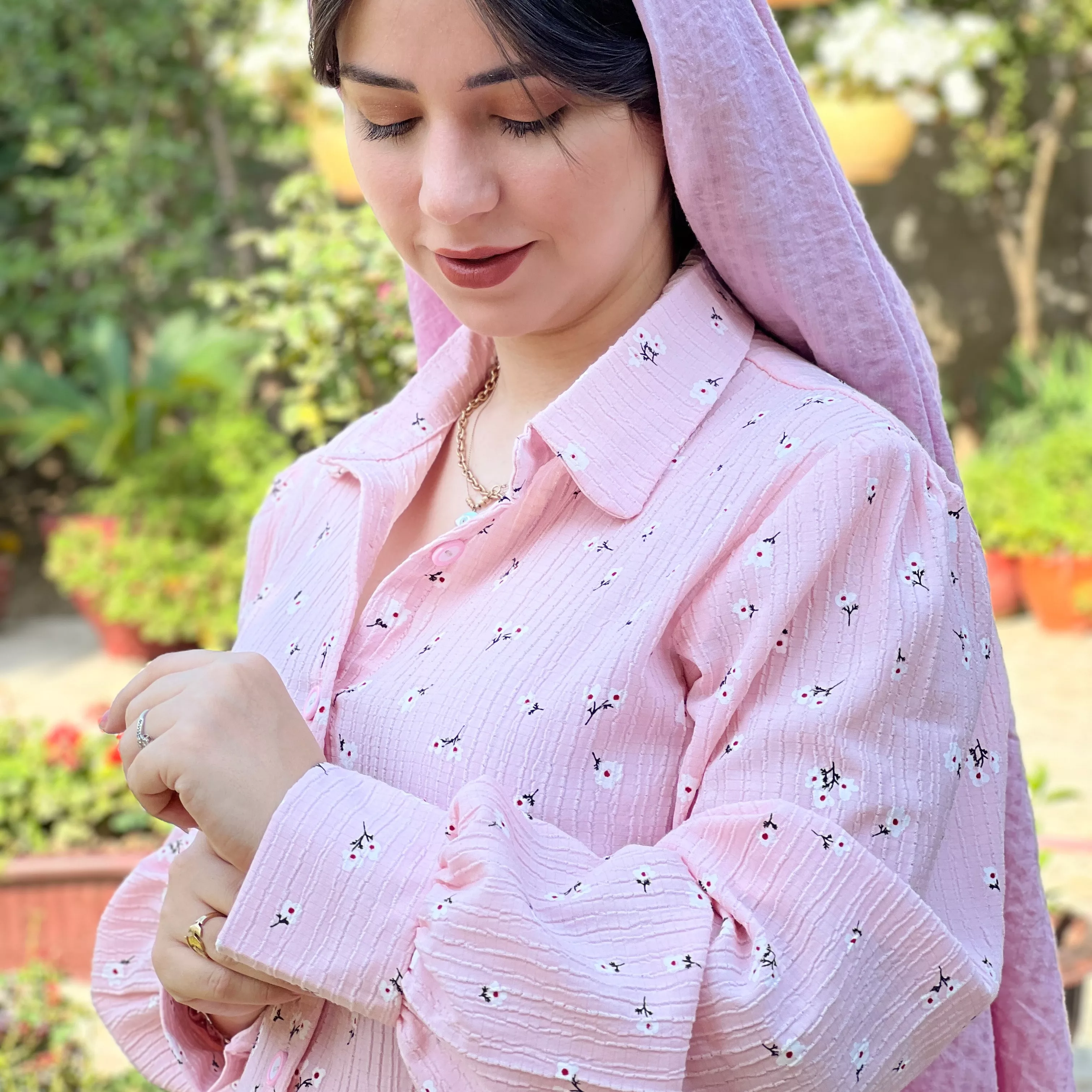 خرید پیراهن گل چرمی صورتی  قد ۱۳۸ بند کمر دارد 