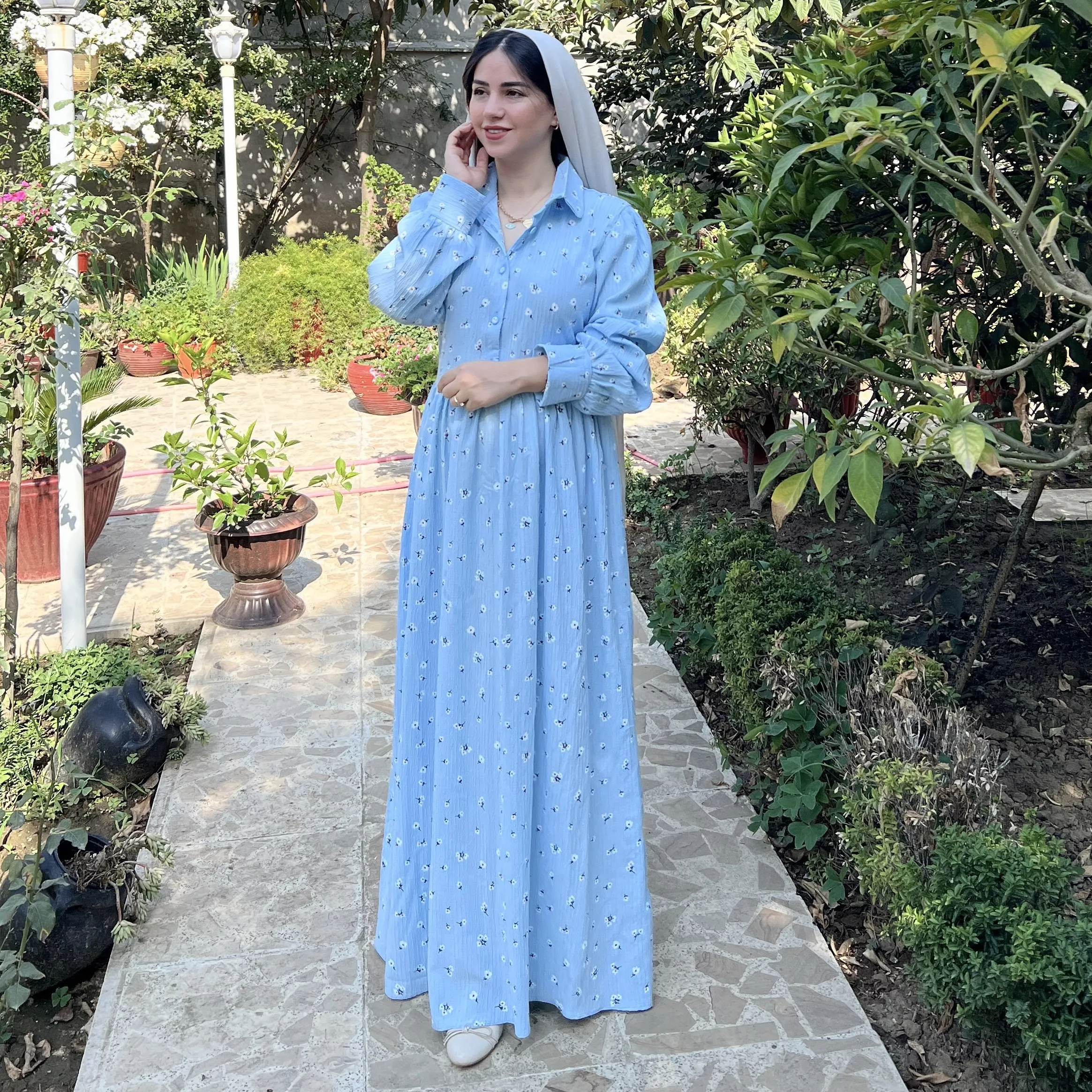 خرید پیراهن گل چرمی ابی  قد ۱۳۸ بند کمر دارد 