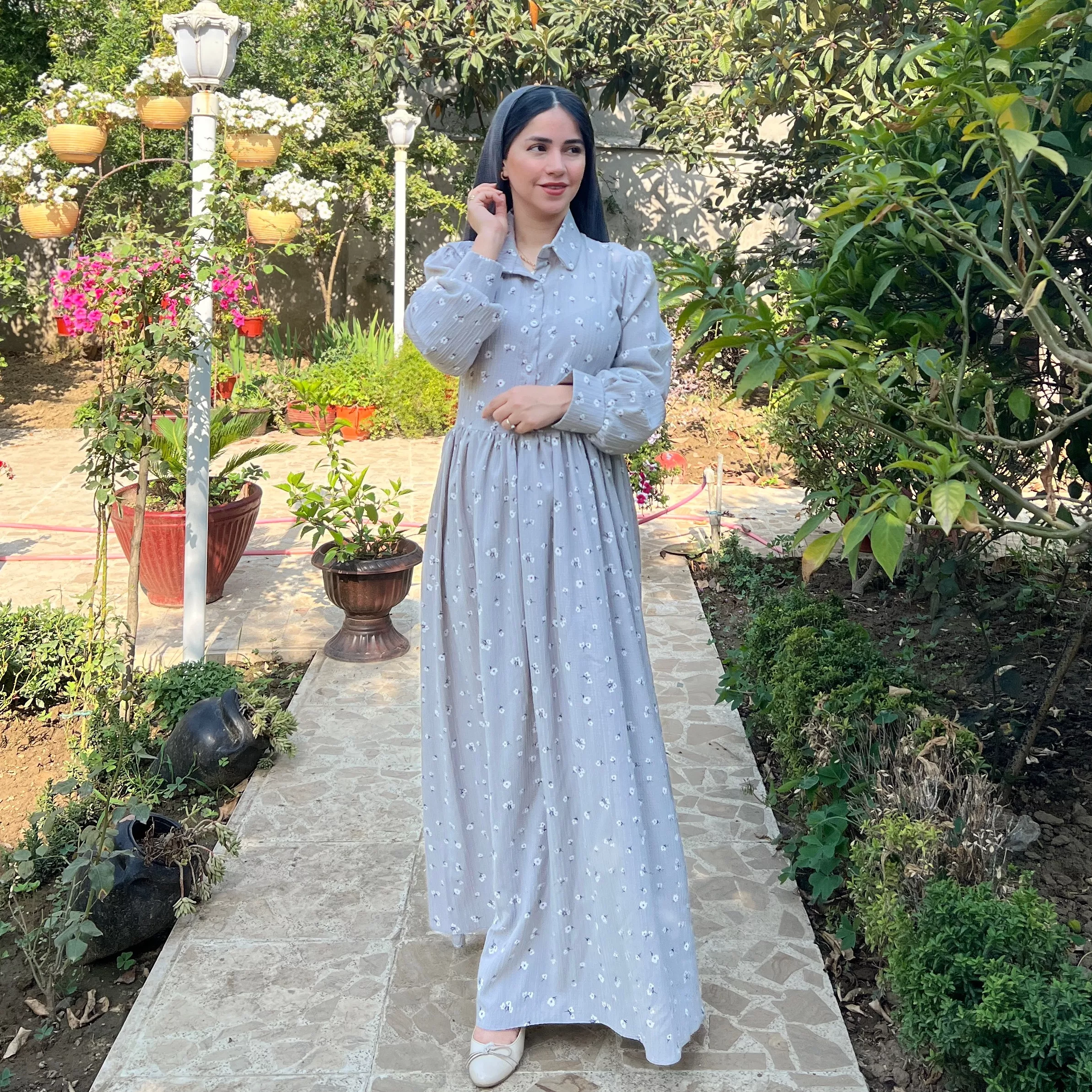 خرید پیراهن گل چرمی طوسی قد ۱۳۸ بند کمر دارد 